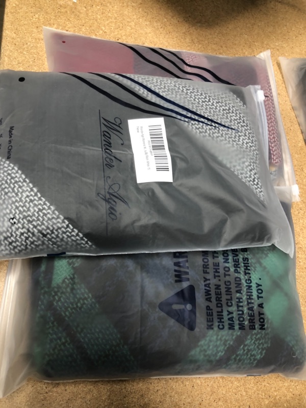 Photo 1 of SOLD AS IS BUNDLE OF 3 WANDER AGIO WOMENS SCARFS NOT REFUNDABLE.