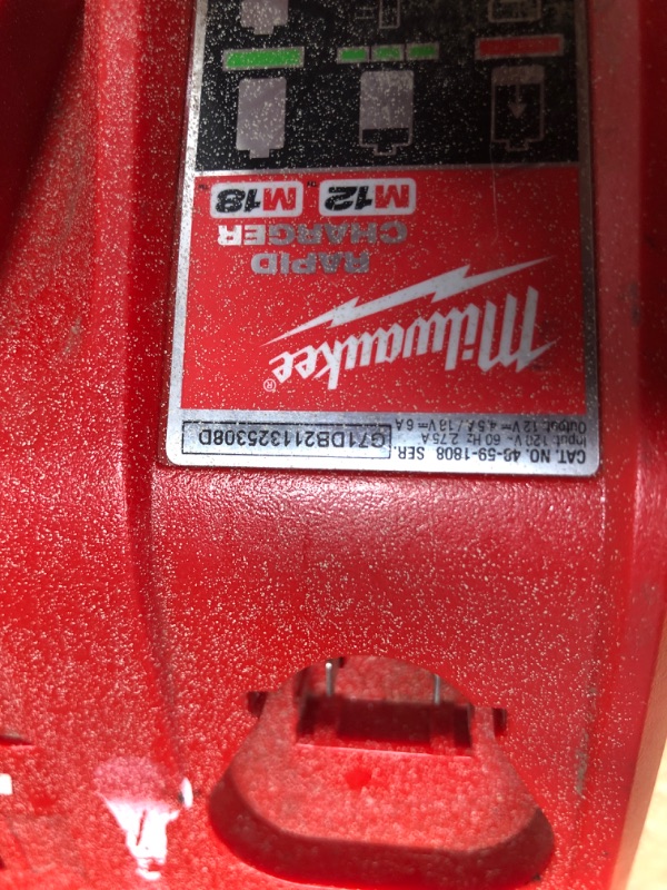 Photo 3 of **UNKNOWN FUNCTIONALITY** Milwaukee 48-59-1808 M12 and M18 12 Volt/18 Volt Lithium-Ion Multi-Volatge Rapid Battery Charger 
