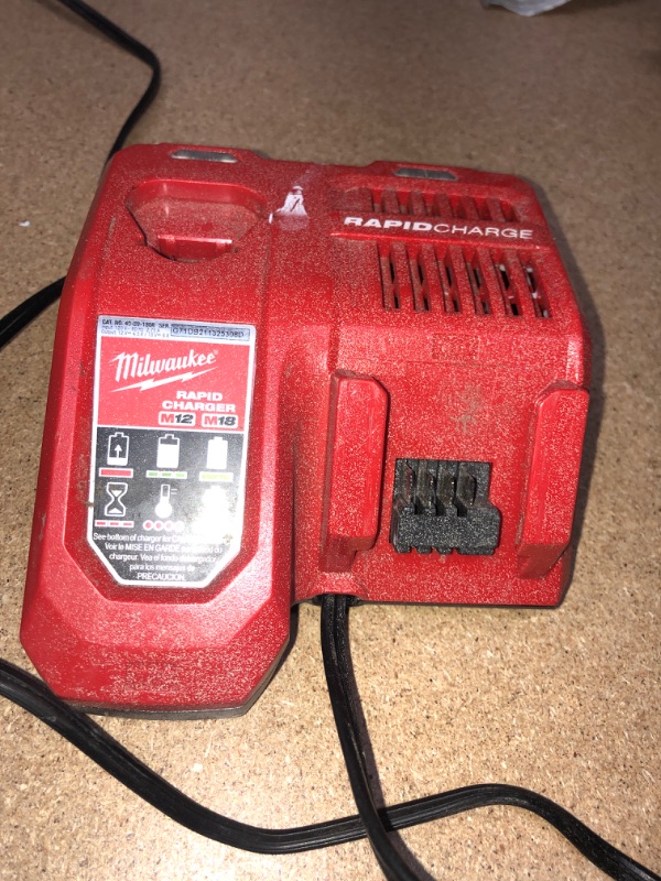 Photo 2 of **UNKNOWN FUNCTIONALITY** Milwaukee 48-59-1808 M12 and M18 12 Volt/18 Volt Lithium-Ion Multi-Volatge Rapid Battery Charger 
