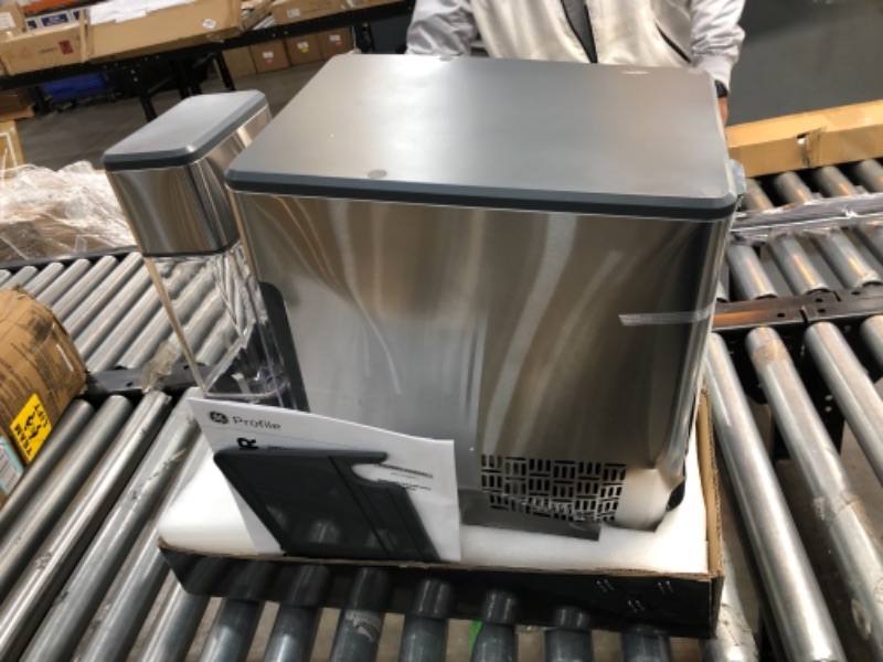 Photo 4 of //TESTED, POWERS ON// MAJOR DAMAGE//PARTS ONLY

GE Profile Opal | Countertop Nugget Ice Maker with Side Tank | Portable Ice Machine with Bluetooth Connectivity | Smart Home Kitchen Essentials | Stainless Steel Finish | Up to 24 lbs. of Ice Per Day


