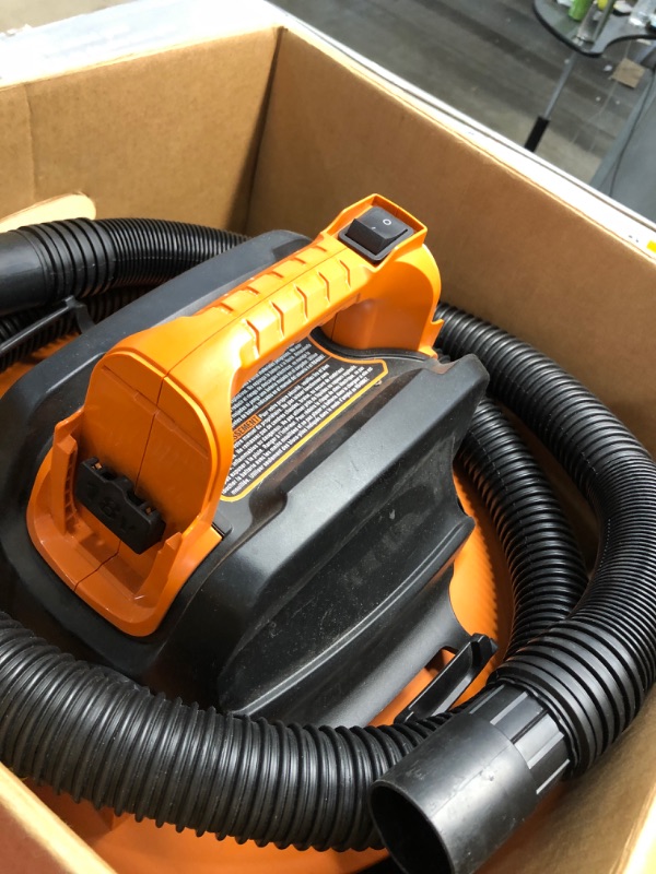 Photo 2 of **NO BATTERIES** RIDGID 9 Gal. 18-Volt Cordless Wet/Dry Shop Vacuum (Tool Only) with Filter, Hose and Accessories, Oranges/Peaches
