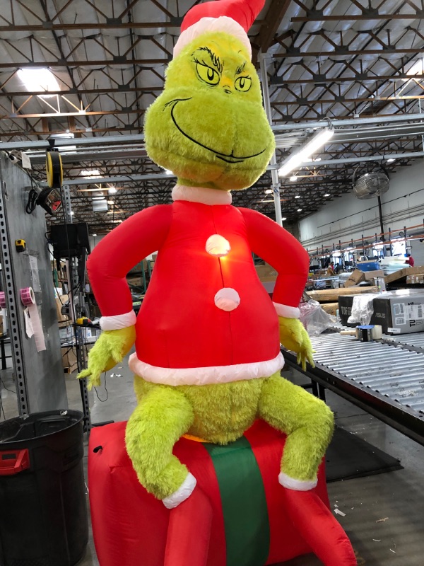 Photo 1 of 9.5 Ft Pre-Lit LED Airblown Dr. Seuss Fuzzy Plush Grinch on Present Christmas Inflatable
MINOR TEAR