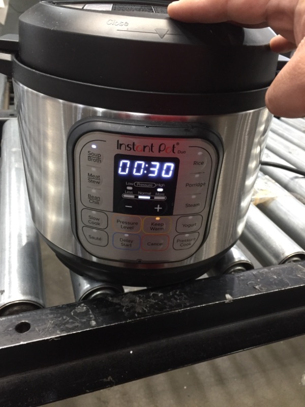 Photo 2 of ***Needs Clean*** Instant Pot Duo Mini 3 Qt 7-in-1 Multi- Use Programmable Pressure Cooker, Slow Cooker, Rice Cooker, Steamer, Sauté, Yogurt Maker and Warmer