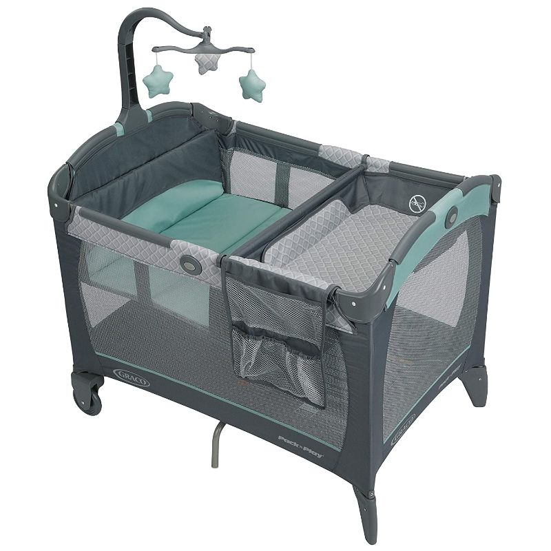 Photo 1 of Graco Pack 'n Play Change 'n Carry Playard with Bassinet, Manor
