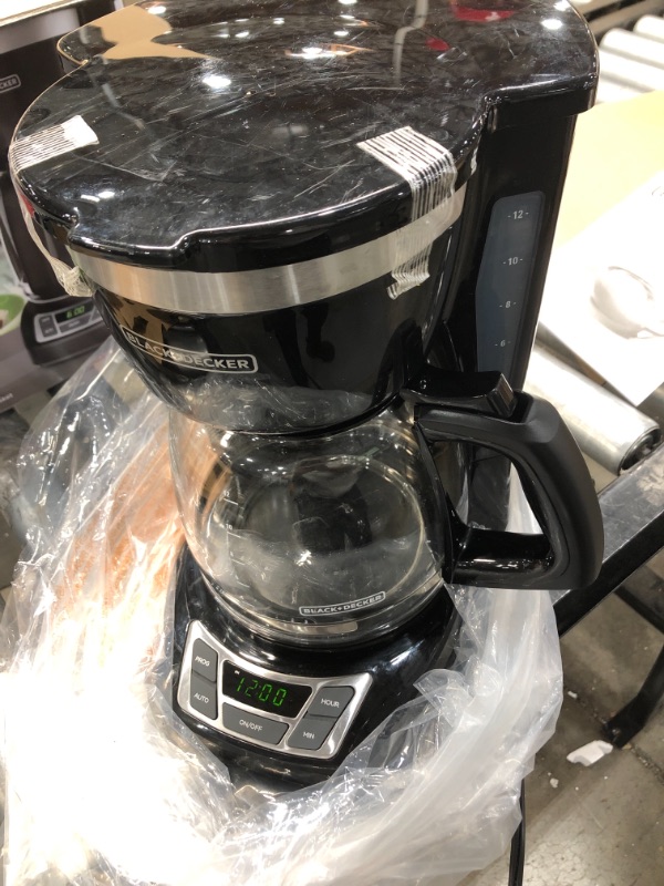 Photo 2 of Black+Decker CM1160B 12-Cup Programmable Coffee Maker, Black/Stainless Steel

//MINOR COSMETIC DAMAGE, TESTED AND FUNCTIONAL
