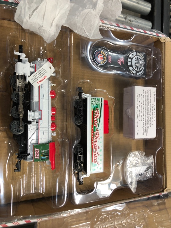 Photo 2 of Lionel Winter Wonderland LionChief 0-8-0 Set with Bluetooth Capability, Electric O Gauge Train Set with Remote
