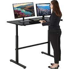 Photo 1 of Adjustable Standing Desk, 47" Computer Desk Height Converter Large Desktop Stand Up Desk Fit Dual Monitor for Home Office,Black
