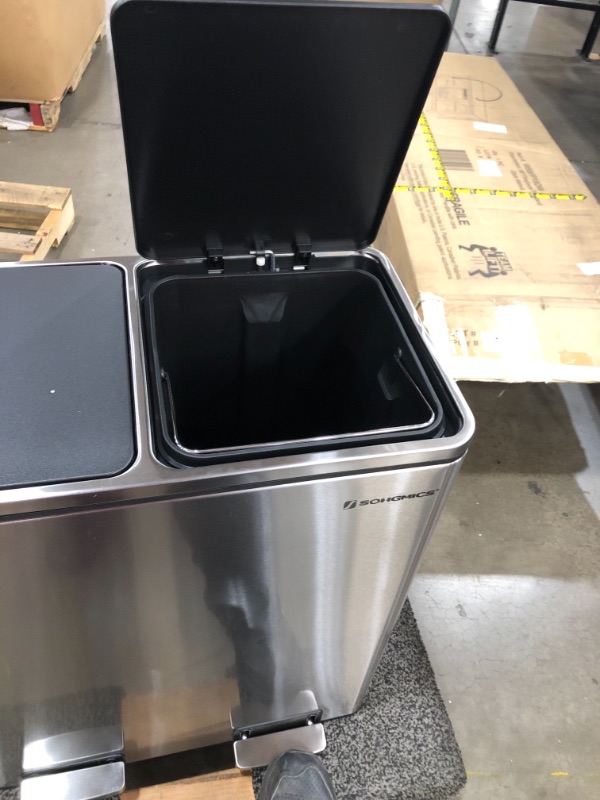 Photo 4 of ***SMALL DENT*** SONGMICS Dual Trash Garbage Can, 16 Gal (60L) Rubbish Bin and 15 Trash Bags, Metal Step Bin, with Dual Sections, Plastic Inner Buckets, Hinged Lids, Handles, Soft Closure, Silver ULTB60NL
