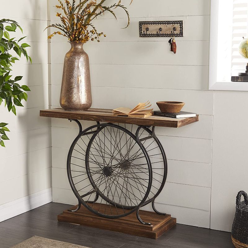 Photo 1 of ***ONLY THE WHEEL***
Deco 79 Metal and Wood Wheel Console, Brown/Black, 14"D x 38"W x 28"H

