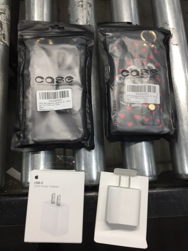 Photo 1 of Apple 20W USB-C Power Adapter & 2 Phone Cases
iPhone 12/12 Pro