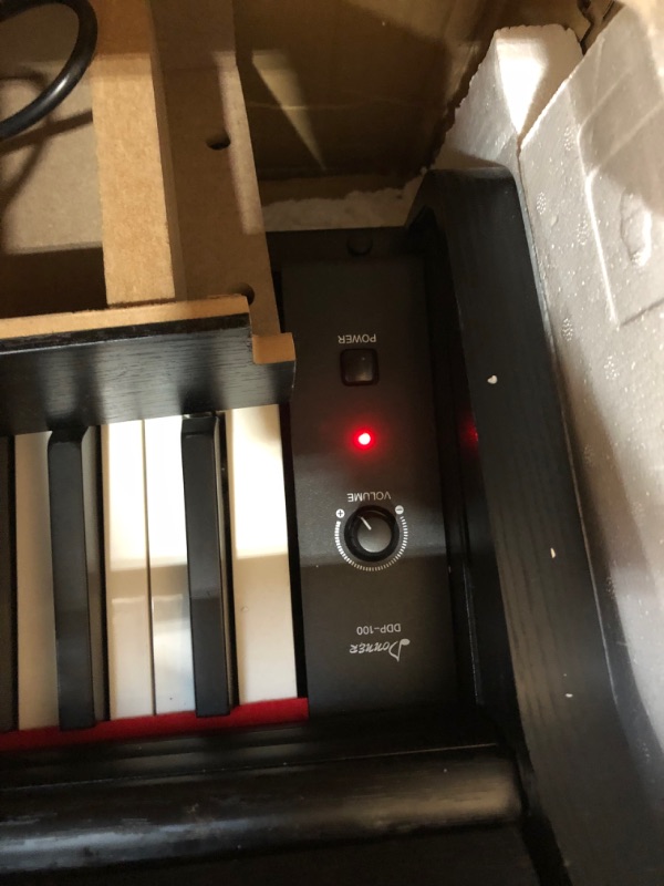 Photo 1 of Donner DDP-100 88-Key Weighted Action Digital Piano, Beginner Bundle with Furniture Stand, Power Adapter, Triple Pedals, MP3 Function, Black ***MISSING LEG***
