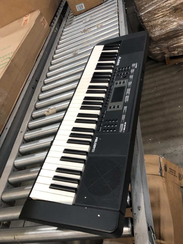 Photo 2 of **INCOMPLETE**
Alesis Melody 61 Key Keyboard Piano with 300 Sounds, Speakers, Digital Piano Stand, Bench, Headphones, Microphone, Music Lessons and Demo Songs
