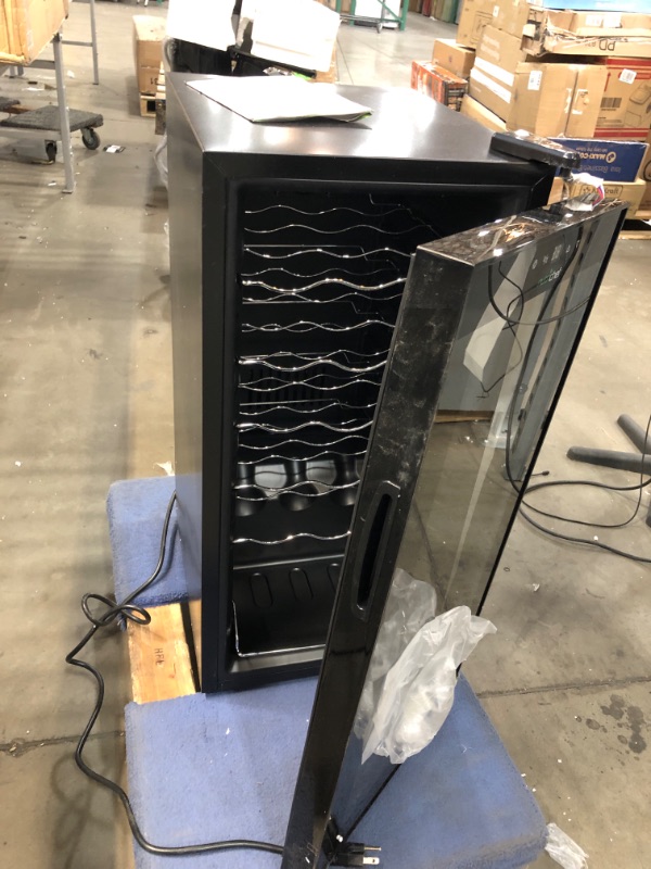 Photo 1 of **PARTS ONLY**
NutriChef Wine Cooler Refrigerator - 18-Bottle Wine Fridge with Air-Tight Glass Door, Touch Screen Digital Temperature Control - Freestanding, Compact - For Apartment, Office, Hotel, Home Bars
