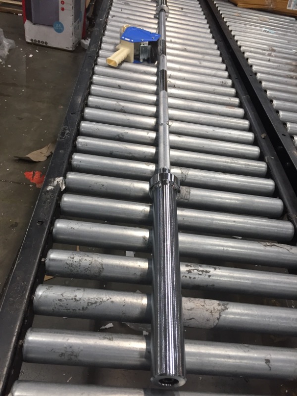 Photo 1 of 45lb weight bar w/ one clip