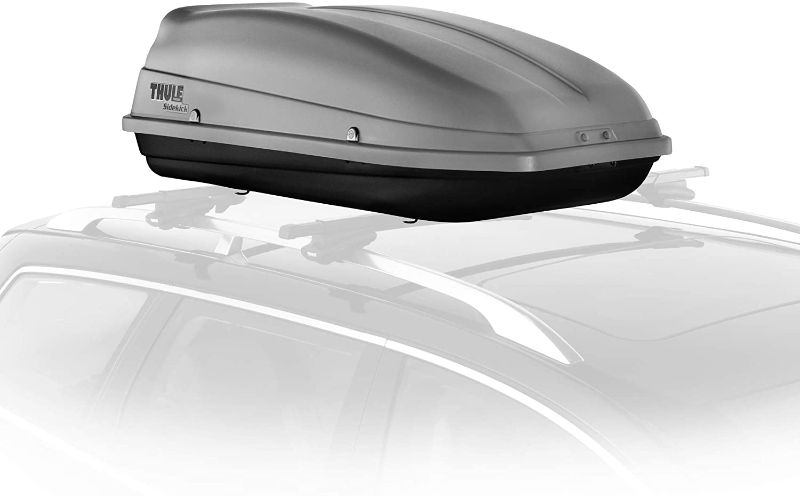 Photo 1 of *MISSING manual*
Thule SideKick Rooftop Cargo Box, External Dimensions: 54 x 25 x 15.5 in, Internal Dimensions: 48 x 23 x 13.5 in


