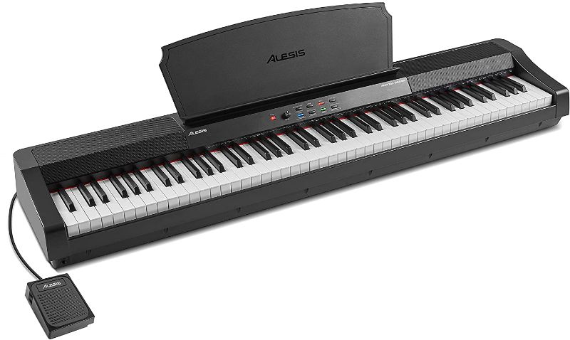 Photo 1 of Alesis Recital Grand - 88 Key Digital Piano with Full Size Graded Hammer Action Weighted Keys, Multi-Sampled Sounds, 50W Speakers, FX and 128 Polyphon
