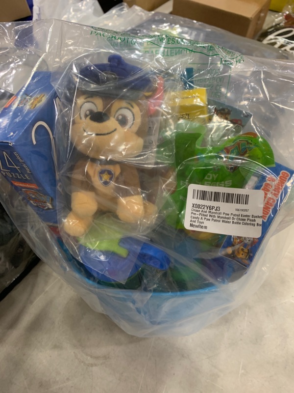 Photo 1 of Chase And Marshall Paw Patrol Easter Basket Pre-Filled With Marshall Or Chase Plush Candy A Paw Patrol Water Bottle Coloring Book And Toys
AS IS EXPIRES OCT 2022