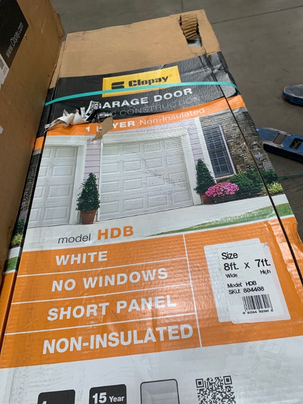 Photo 1 of Classic Collection 8 ft. x 7 ft. Non-Insulated White Garage Door
AS IS 