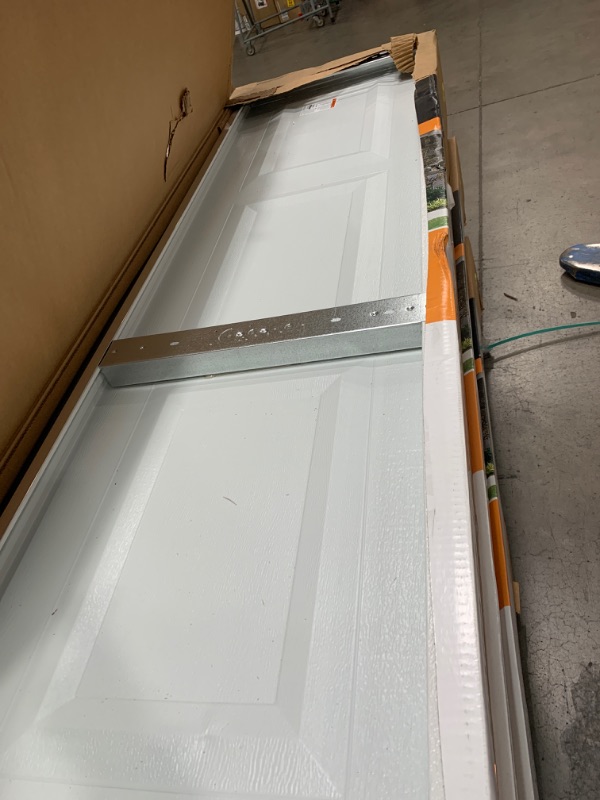 Photo 1 of Classic Collection 8 ft. x 7 ft. Non-Insulated White Garage Door
AS IS 