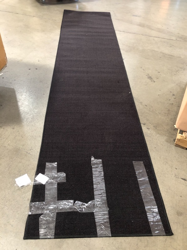 Photo 1 of BLACK RUNNING RUG
USED
ESTIMATED SIZE: 142'' x 31''