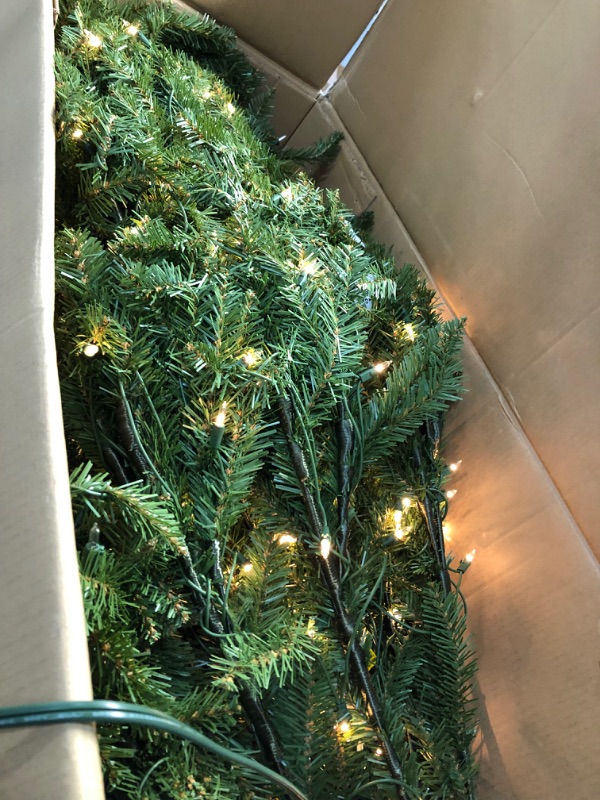 Photo 2 of National Tree Company Pre-Lit Artificial Full Christmas Tree, Green, Dunhill Fir, White Lights, Includes Stand, 9 Feet
