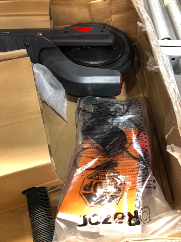 Photo 1 of Razor C25 Electric Scooter – Air-Filled Tires, Rear-Wheel Drive, Foldable & Portable, Sturdy Electric Scooter for Commute & Recreation
