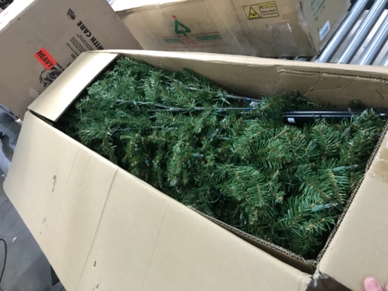 Photo 2 of **ONLY PARTS OF THE TREE LIGHT UP**
National Tree Company Pre-Lit Artificial Full Christmas Tree, Green, Dunhill Fir, White Lights, Includes Stand, 7 Feet

