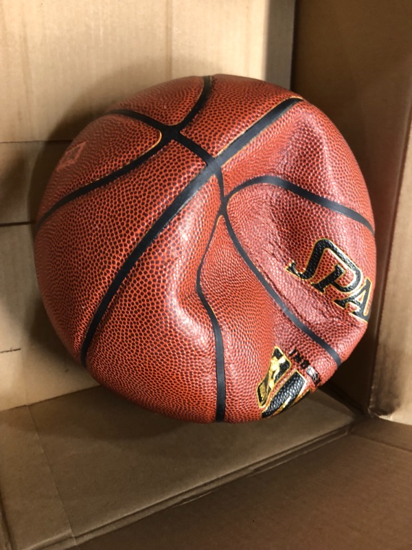 Photo 2 of **deflated** Spalding NBA Official Indoor/Outdoor Basketball