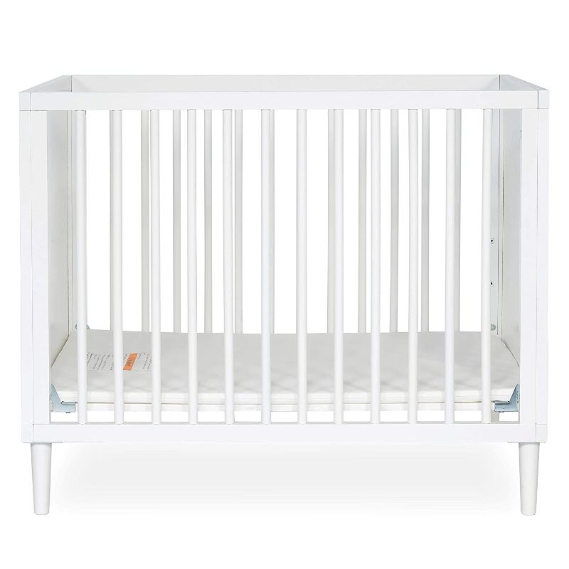 Photo 1 of Dream On Me Lucas Mini Modern Crib with Rounded Spindles in White , 39x25.5x33 Inch (Pack of 1)
