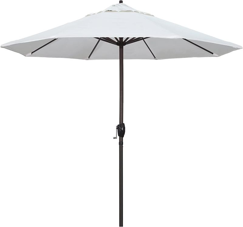 Photo 1 of California Umbrella 9' Round Aluminum Market Umbrella, Crank Lift, Auto Tilt, Bronze Pole, White Olefin
