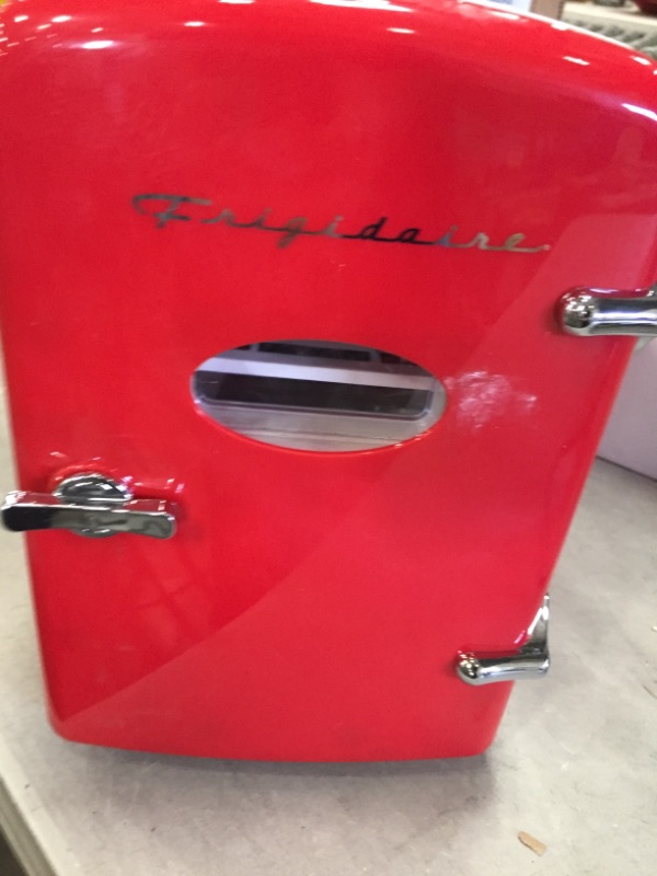 Photo 2 of 0.3 cu. ft. 6-Can Retro Mini Fridge in Red
little buff marks  on top