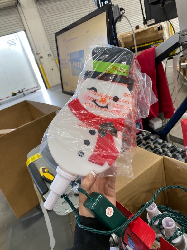 Photo 1 of 20 in. Christmas ColorMotion Snowman Pathway Stakes (Set of 4)
