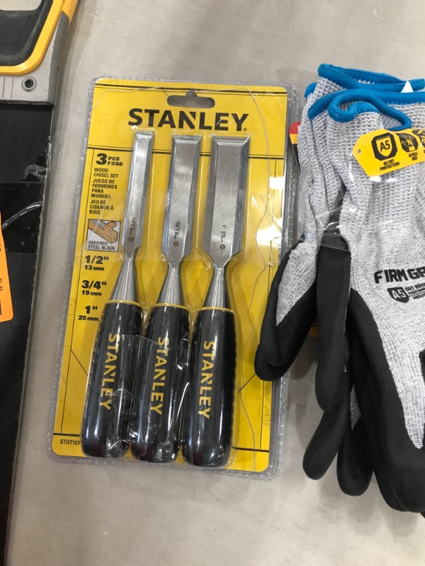 Photo 9 of BUNDLE OF HOME TOOLS, DEWALT 4 Lb. Fiberglass Blacksmith Hammer
AND, Stanley Wood Chisel Set (3-Piece) AND, 15 in. Tooth Saw with Aluminum Handle(USED) AND, Large ANSI A5 Cut Resistant Work Gloves (3-Pair) 


