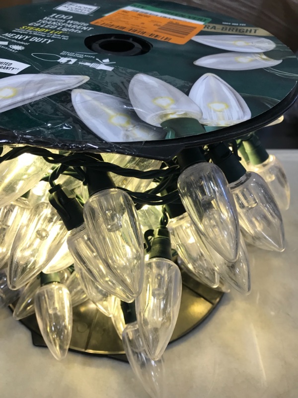 Photo 1 of 50 ft. 100-Light Warm White Transparent Bulb LED C9 Steady Lit Ultra Bright Heavy Duty Lights
**USED, NOT ALL BULBS TURN ON**