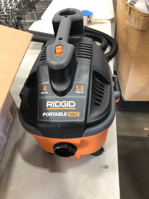 Photo 5 of RIDGID 4 Gallon 5.0-Peak HP Portable Wet/Dry Shop Vacuum with Fine Dust Filter, Hose and Accessories, Oranges/Peaches

//MISSING BAGS 
