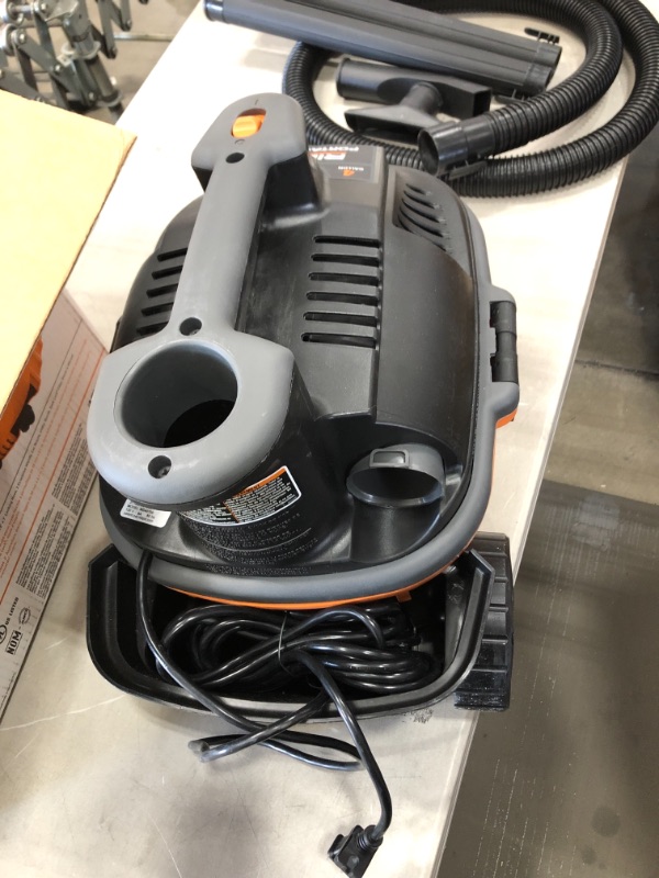 Photo 2 of RIDGID 4 Gallon 5.0-Peak HP Portable Wet/Dry Shop Vacuum with Fine Dust Filter, Hose and Accessories, Oranges/Peaches

//MISSING BAGS 
