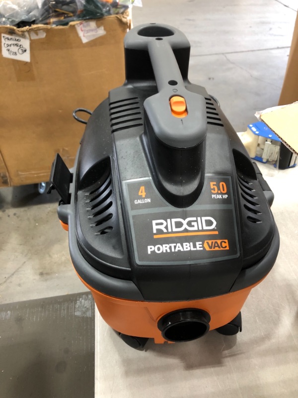 Photo 5 of RIDGID 4 Gallon 5.0-Peak HP Portable Wet/Dry Shop Vacuum with Fine Dust Filter, Hose and Accessories, Oranges/Peaches

//MISSING ALL ACCESSORIES 
