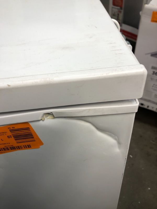 Photo 10 of MAGIC CHEF 5.0 cu. ft. Chest Freezer in White

//MAJOR COSMETIC DAMAGE WITH DENTS AND SCRATCHES, TESTED AND FUNCTIONAL
