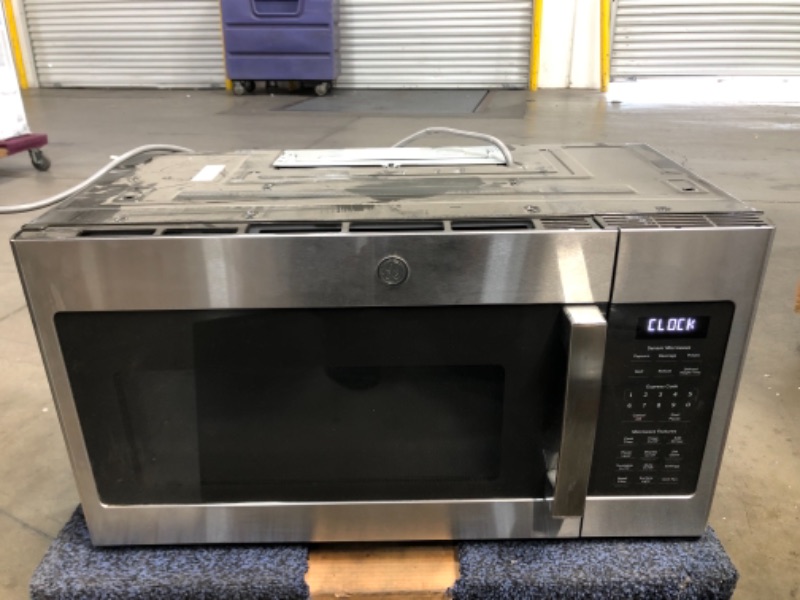 Photo 2 of GE 1.7 Cu. Ft. Over the Range Microwave with Sensor Cooking in Stainless Steel, Silver

//MINOR COSMETIC DAMAGE, TESTED AND FUNCTIONAL 
