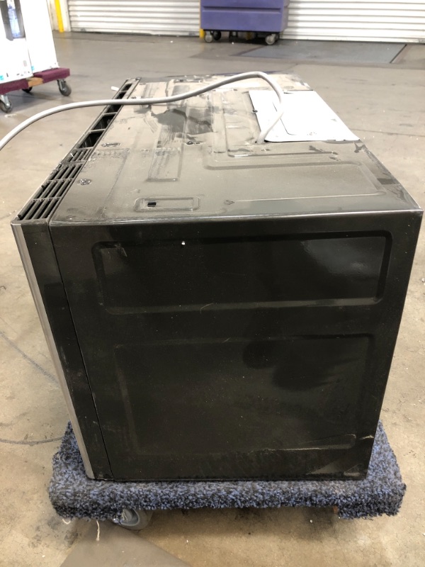 Photo 3 of GE 1.7 Cu. Ft. Over the Range Microwave with Sensor Cooking in Stainless Steel, Silver

//MINOR COSMETIC DAMAGE, TESTED AND FUNCTIONAL 
