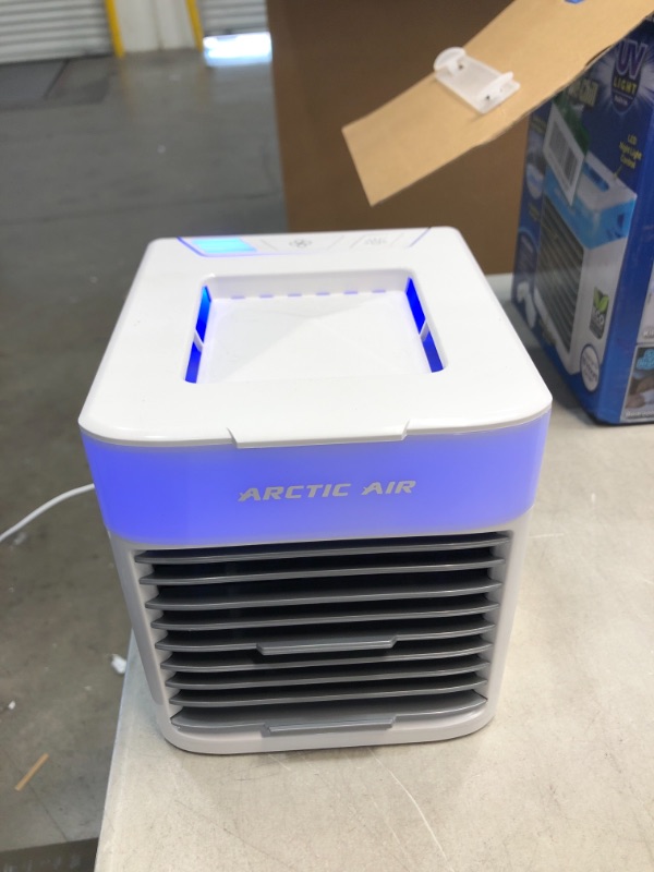 Photo 2 of Ontel Arctic Air Pure Chill Evaporative Ultra Portable Personal Air Cooler with 4-Speed Air Vent, As Seen on TV

//TESTED AND FUNCTIONAL 
