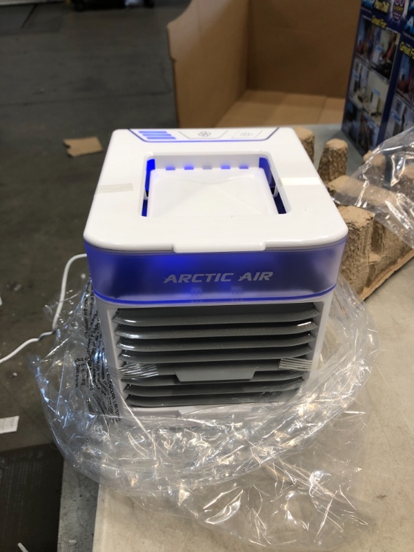 Photo 2 of Ontel Arctic Air Pure Chill Evaporative Ultra Portable Personal Air Cooler with 4-Speed Air Vent, As Seen on TV

//TESTED AND FUNCTIONAL
