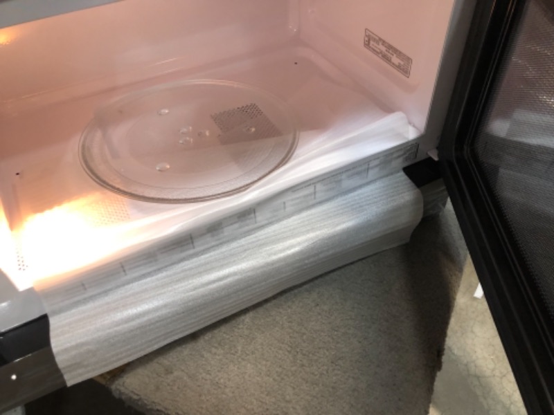 Photo 1 of 1.6 cu. ft. Over the Range Microwave in Black

