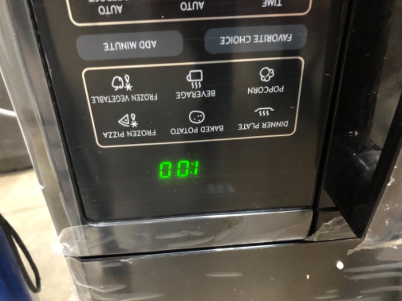 Photo 1 of 1.6 cu. ft. Over the Range Microwave in Black
