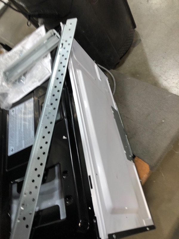 Photo 1 of 1.6 cu. ft. Over the Range Microwave in Black
