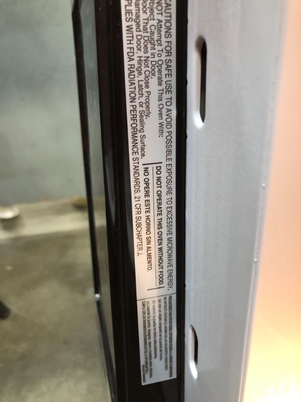 Photo 1 of 1.6 cu. ft. Over the Range Microwave in Black
