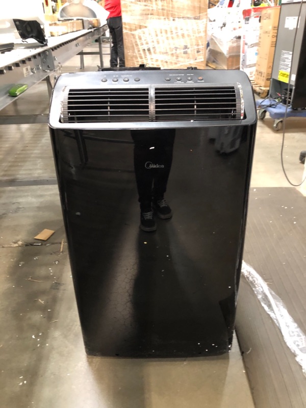 Photo 2 of Midea Duo 12,000 BTU(10,000 BTU SACC)Ultra Quiet Smart HE Inverter Portable Air Conditioner,Dehumidifier,and Fan-Cools upto 450 sq.ft,Works with Alexa/Google Assistant Includes Remote Control,Black
//tested power on 