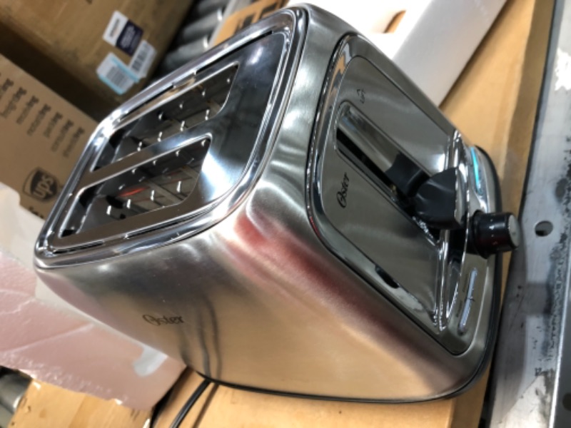 Photo 2 of **USED**
Oster 2-Slice Toaster with Advanced Toast Technology, Stainless Steel
