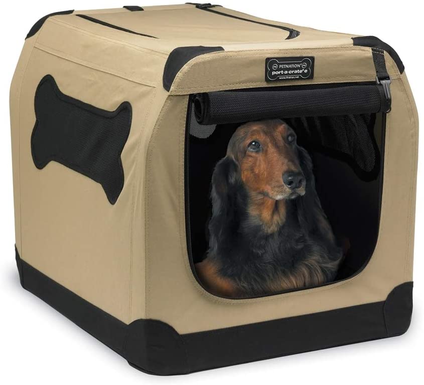 Photo 1 of *USED, TEAR TO ONE MESH BONE WINDOW**
32"Petnation Port-A-Crate Indoor and Outdoor Home for Pets
