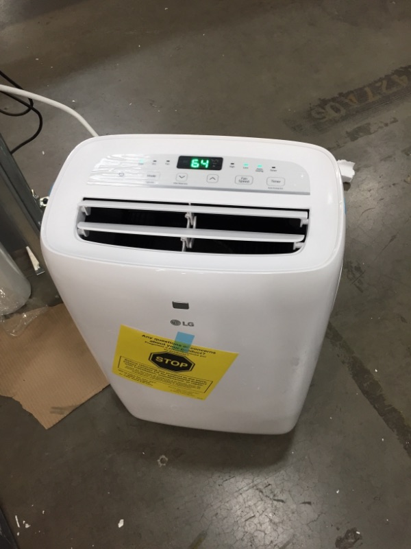 Photo 1 of LG 7,000 BTU (DOE) / 10,000 BTU (ASHRAE) Portable Air Conditioner, Cools 300 Sq.Ft. (12' x 25' room size), Quiet Operation, LCD Remote, Window Installation Kit Included, 115V
